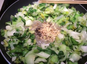Oil, garlic, ginger in veggies