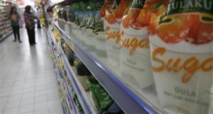 Bags of white sugar are displayed in a supermarket in Jakarta