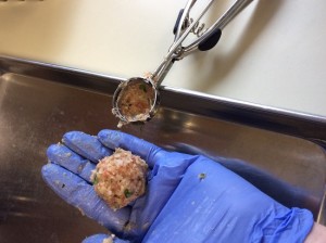Scooping the meat into a ball